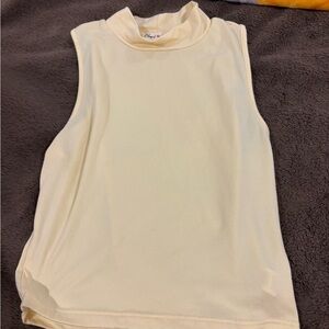 Sleeveless Yellow Mock Neck Top